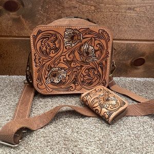 Handmade/ hand tooled leather sling/crossbody bag